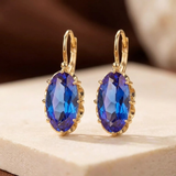 Boucles d'oreilles pendantes en or et saphir