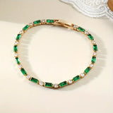 Bracelet de tennis alterné en or et émeraude