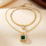 Collier superposé en or et émeraude