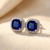 Boucles d'oreilles puces en saphir argenté