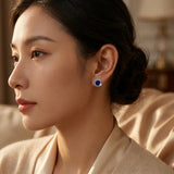 Boucles d'oreilles puces en saphir argenté